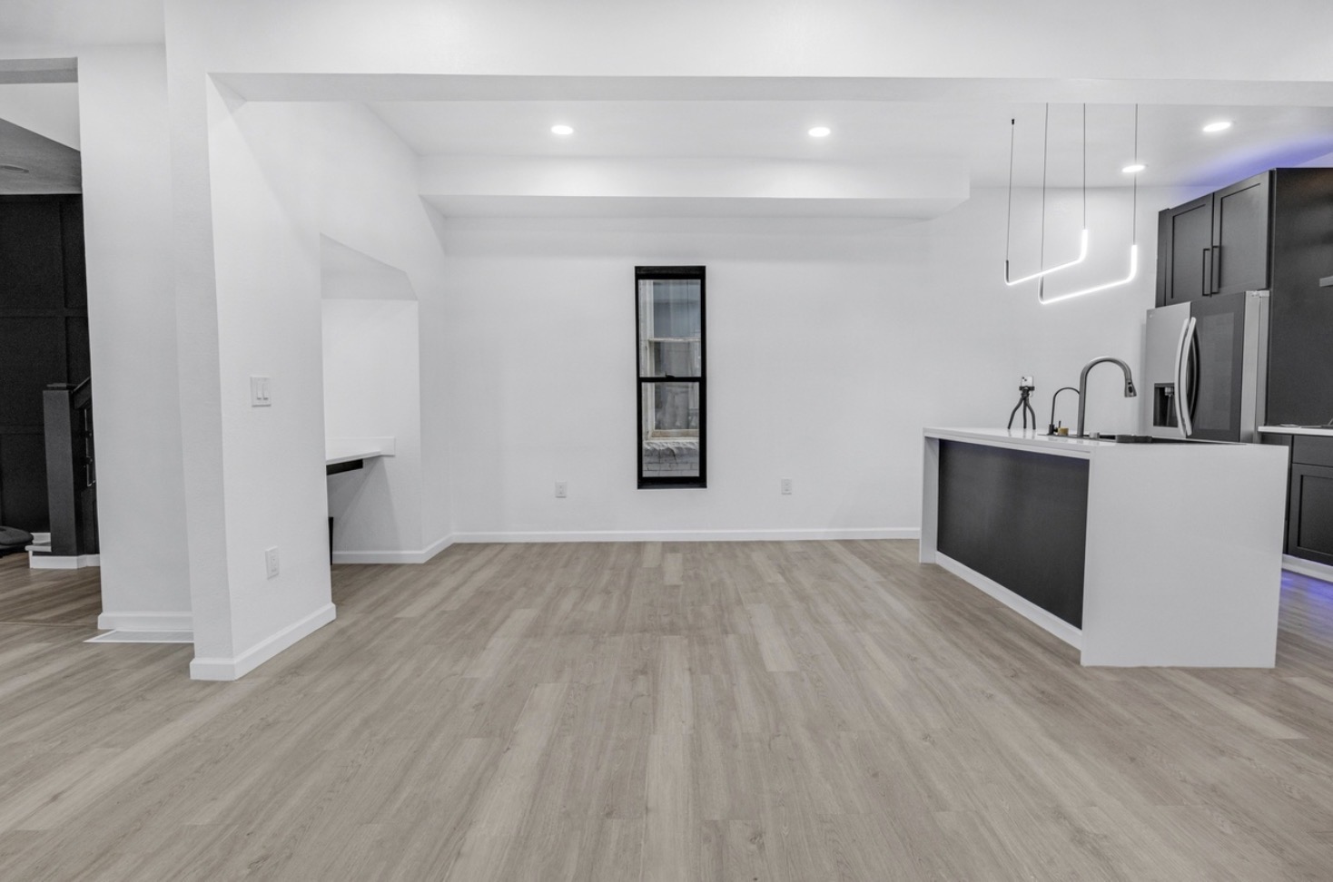 Empty dining and kitchen space before staging